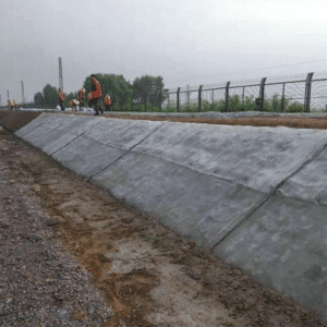 Unrolling Cement Blanket on Slope for Riverbank Protection